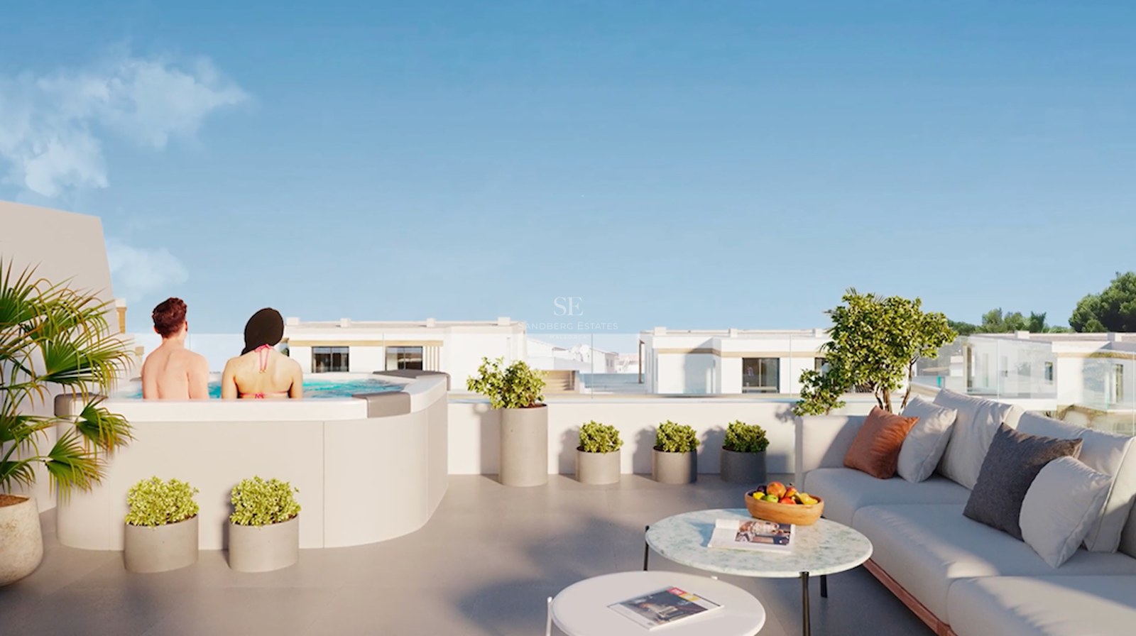 Rooftop terrace featuring a modern jacuzzi, lounge seating, marble tables, and glass railings under a clear blue sky.