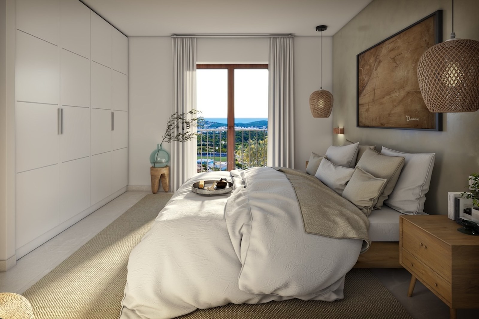 Dormitorio luminoso con cama grande, armarios blancos empotrados y ventana con vistas a la costa y al mar.