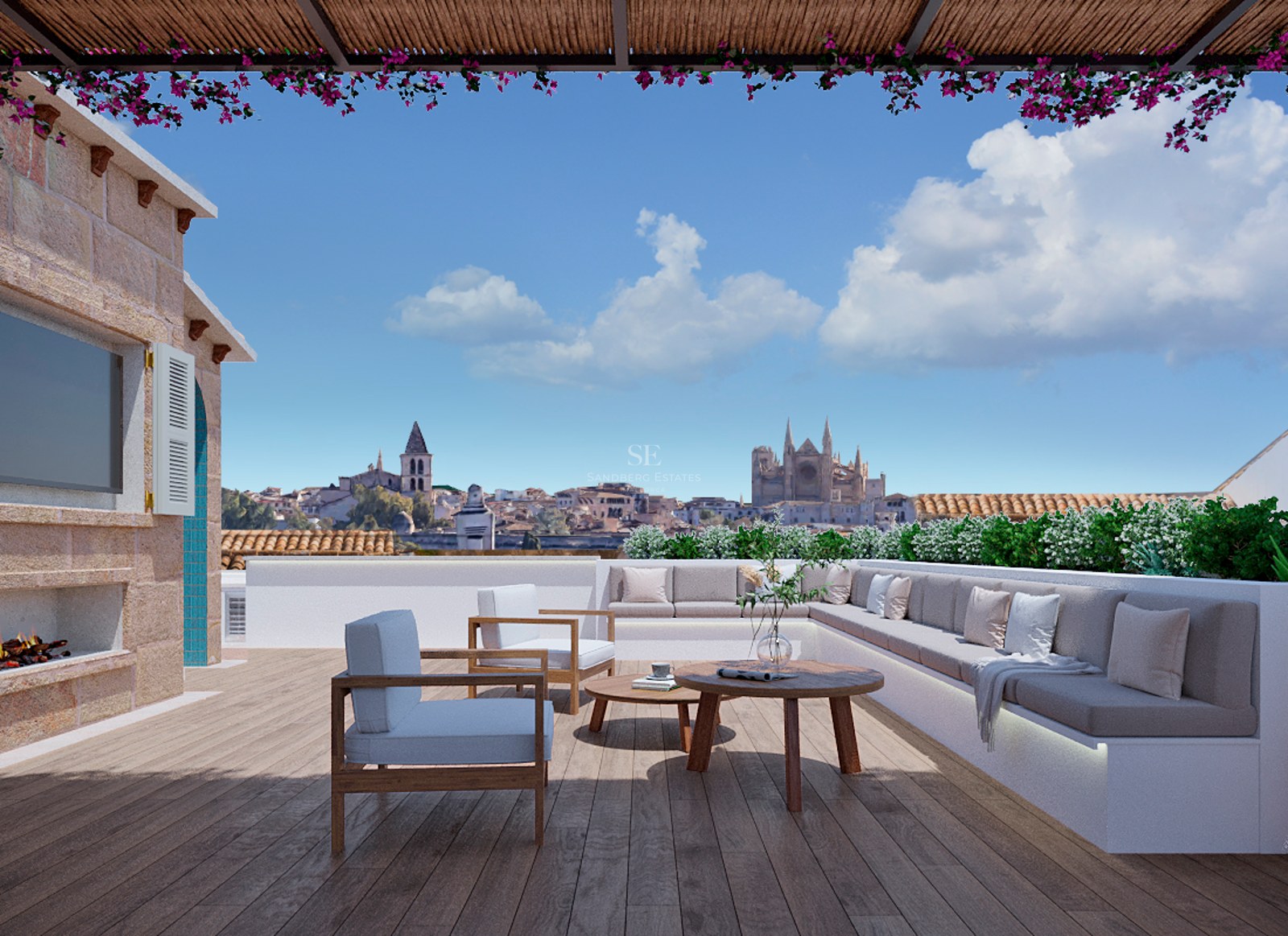Lyxig takterrass med trädäck, bekväma sittplatser, öppen spis och panoramautsikt över stadens katedral.
