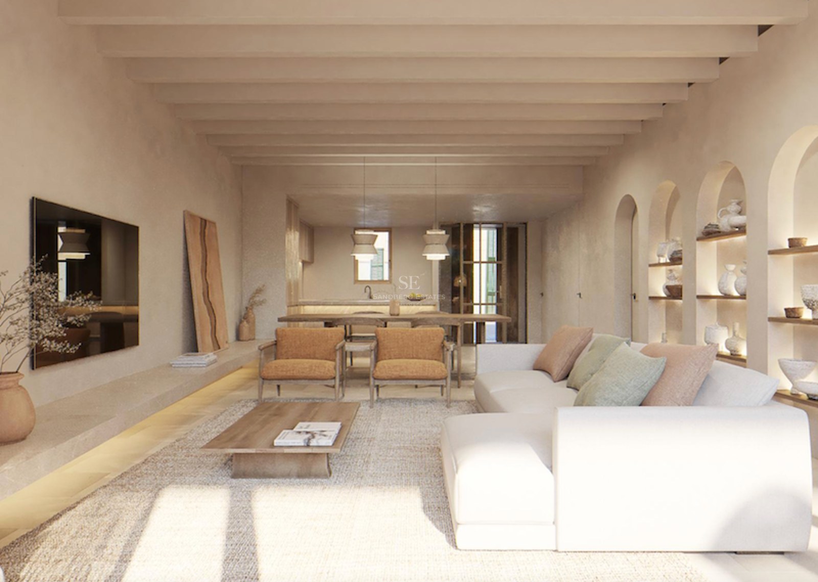 Bright living room with white sofa, wooden ceiling beams, and arched wall niches displaying ceramic pottery.