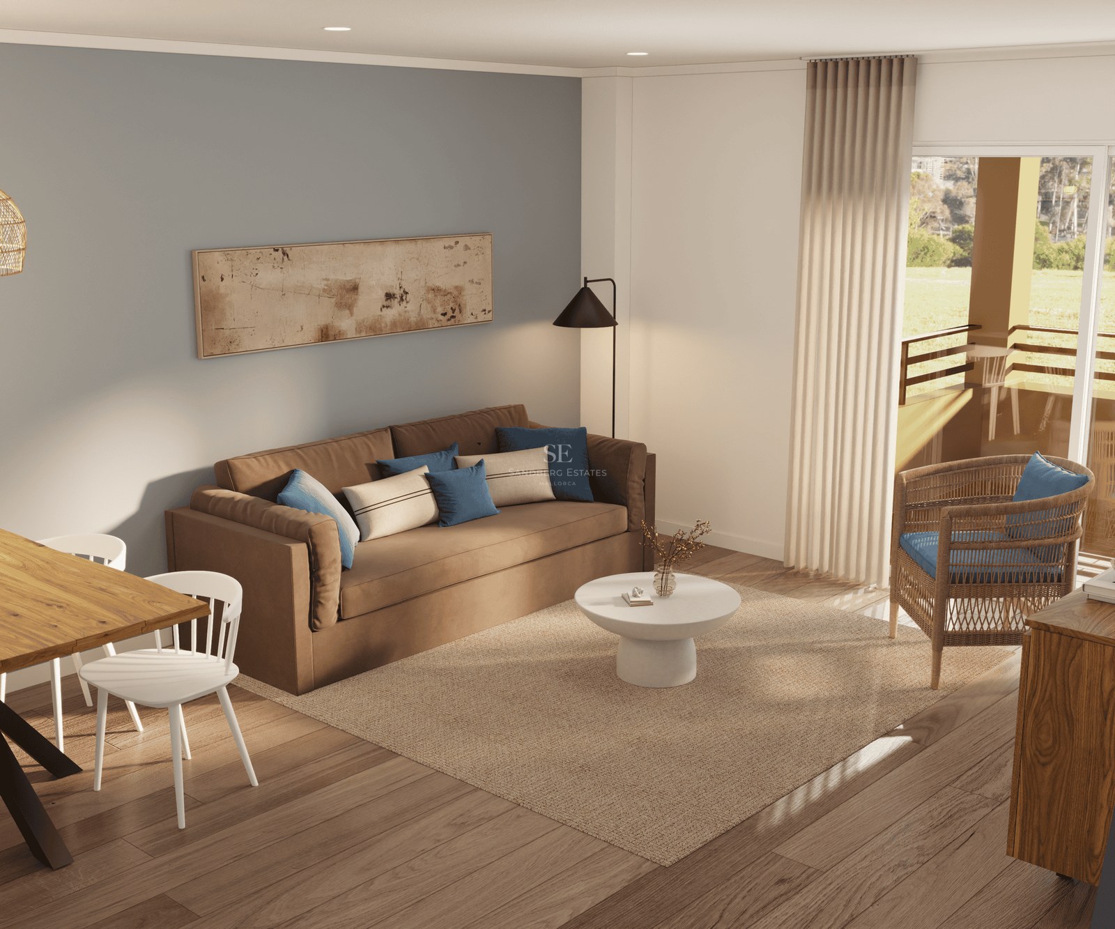 Living room with a brown sofa, white coffee table, jute rug, and wicker chair next to a glass balcony door.