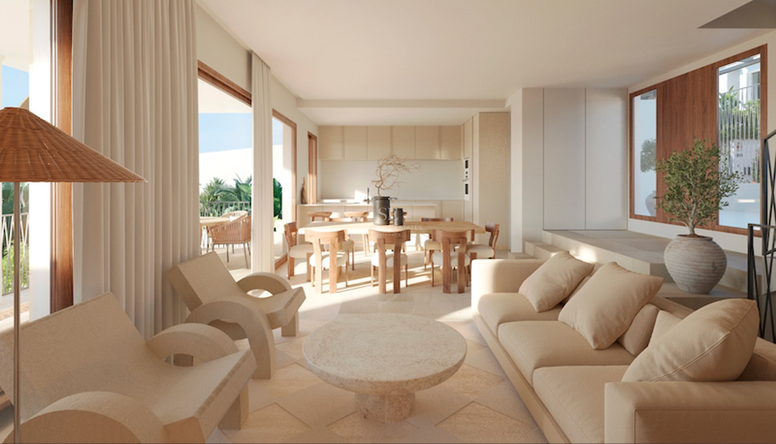 Salon lumineux avec canapés beige, table en pierre et salle à manger en bois menant à une terrasse ensoleillée.