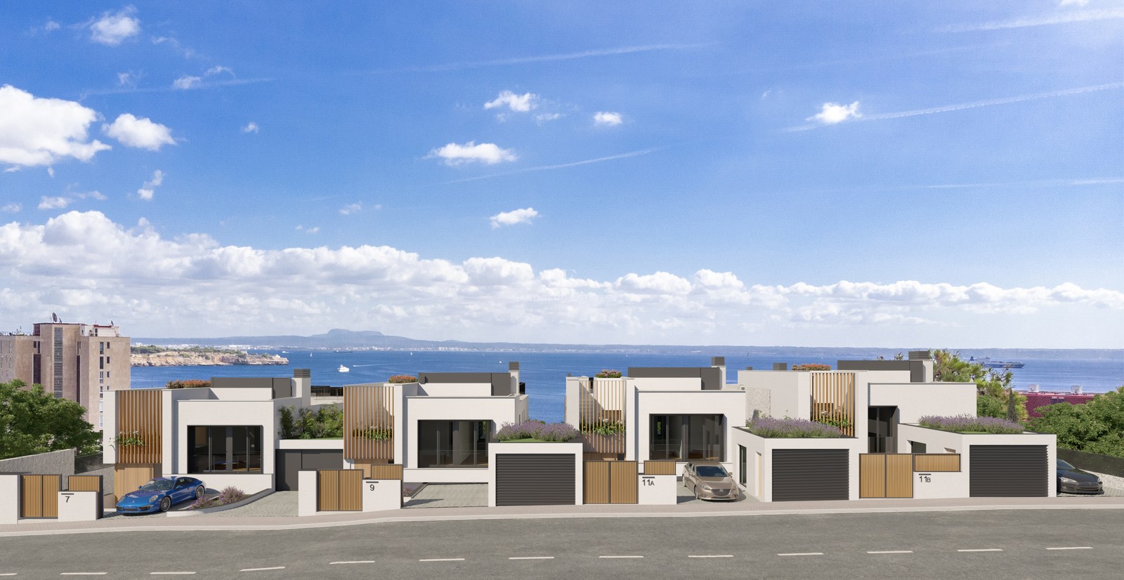 Série de villas contemporaines blanches avec accents en bois surplombant la mer sous un ciel bleu.