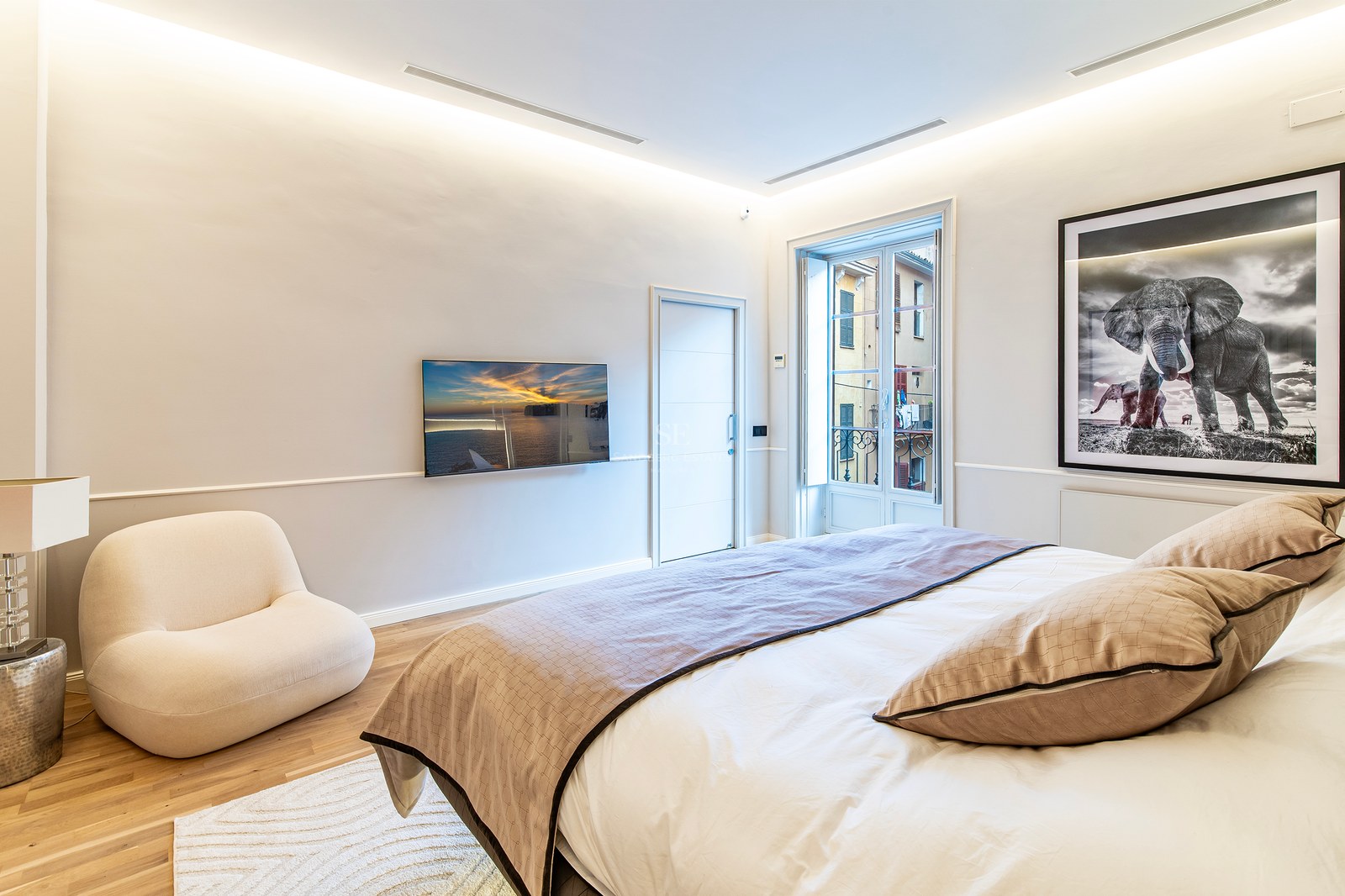 Spacious terrace with infinity pool, sun loungers, and panoramic views. Modern design with elegant furnishings.