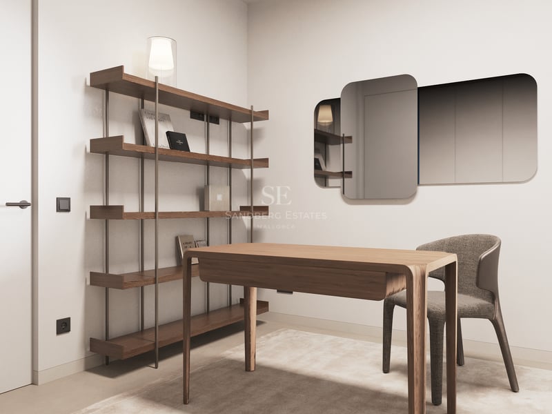 Bureau moderne avec table en bois, chaise grise, étagère ouverte et miroirs décoratifs sur mur neutre.