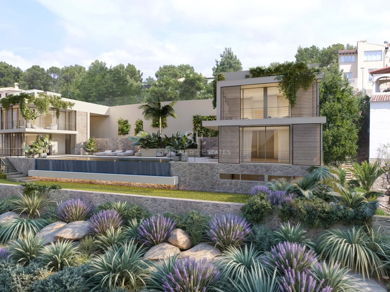 Villa moderne sur deux niveaux avec murs en pierre, grandes baies vitrées et piscine à débordement.
