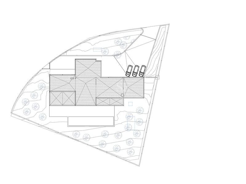 Plan technique en noir et blanc montrant l'implantation du bâtiment, le parking et les espaces paysagers.