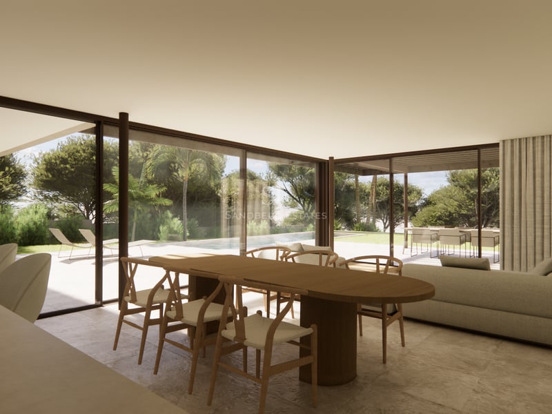 Salon et salle à manger modernes avec de grandes baies vitrées ouvrant sur une terrasse, une piscine et un jardin.
