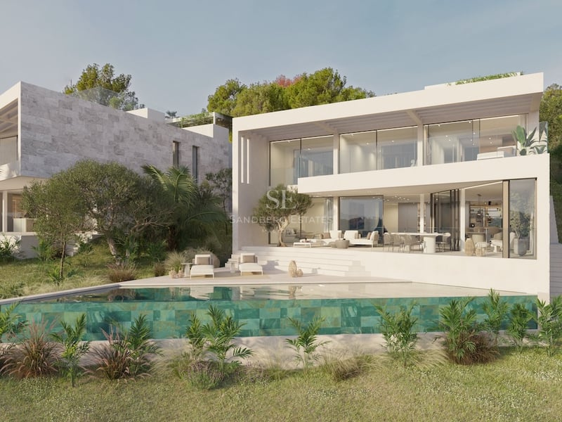 Villa blanche contemporaine avec piscine à débordement, balcons vitrés et jardin méditerranéen.