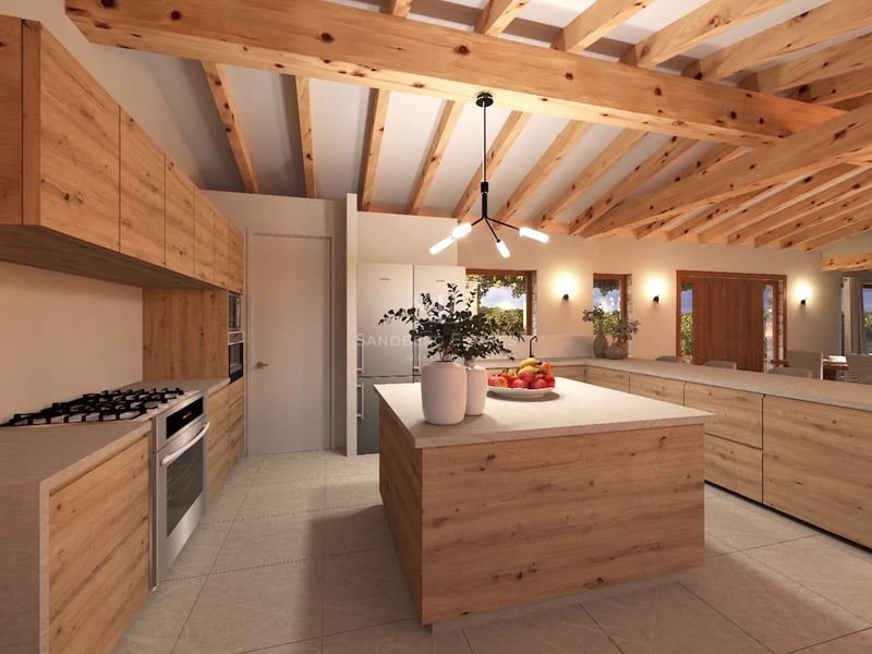 Cuisine spacieuse avec poutres en bois apparentes, armoires en chêne clair et un grand îlot.