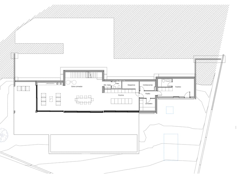 Plan architectural en 2D montrant la disposition du salon, de la cuisine et des zones de service.