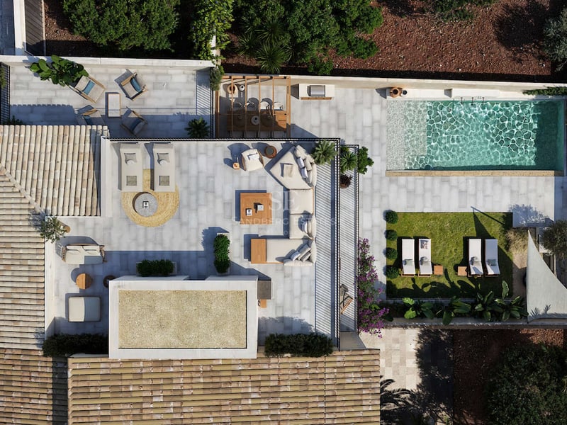 Vue de dessus d'une villa de luxe avec salon sur le toit, salle à manger extérieure et piscine avec jardin.