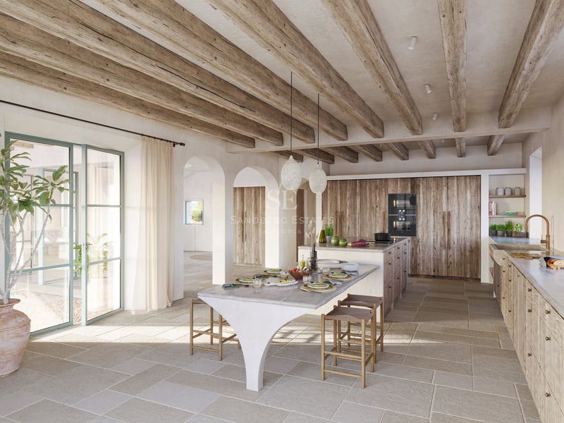 Cuisine rustique moderne avec sol en pierre naturelle, poutres apparentes et un grand îlot en marbre.