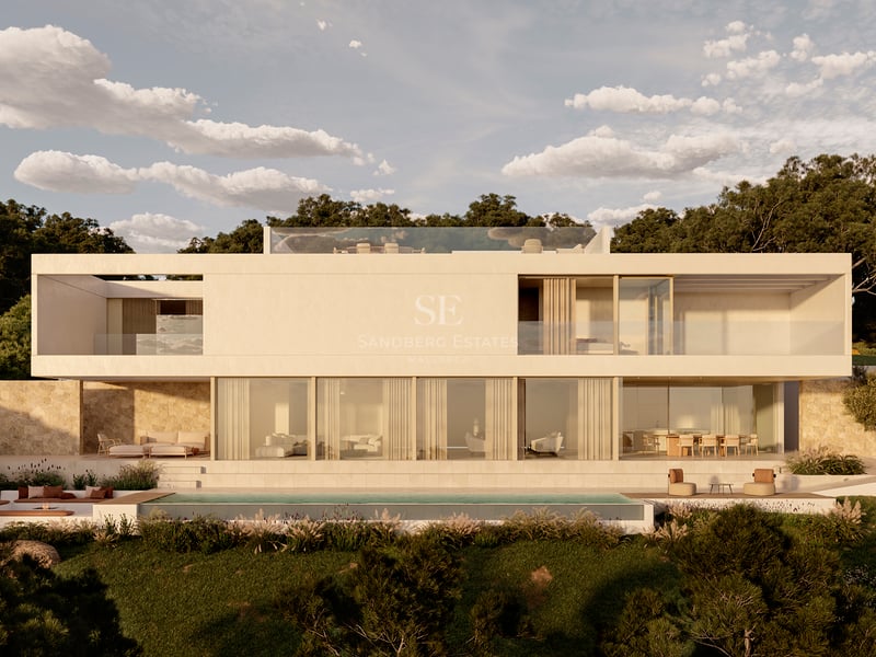 Villa moderne à deux étages avec de grandes baies vitrées, murs en pierre et piscine à débordement sous un ciel dégagé.