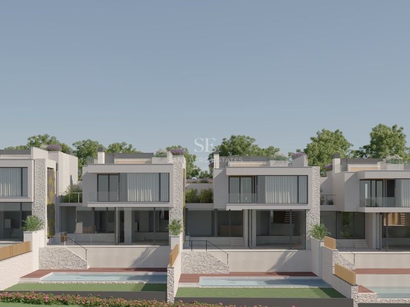 Villas contemporaines blanches avec baies vitrées, murs en pierre et piscines individuelles.