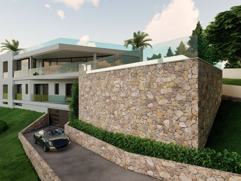 Vue extérieure d'une villa moderne avec piscine à débordement, jardin soigné et grandes baies vitrées. Architecture minimaliste.