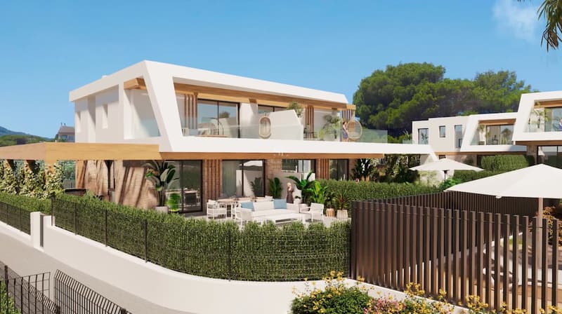 Modern Samtida Villa med Privat Trädgård Modern tvåvåningsvilla med vit arkitektur, naturstensväggar, stora terrasser och anlagd trädgård.