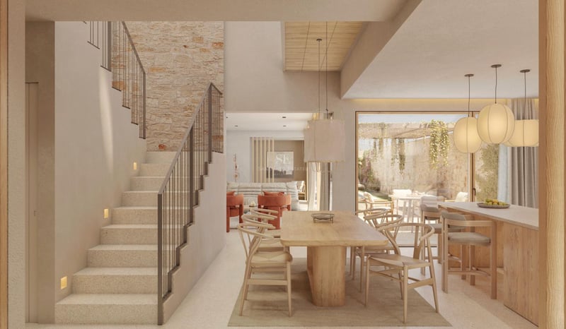 Intérieur moderne lumineux avec une grande table en bois, un mur en pierre et un élégant escalier en pierre.