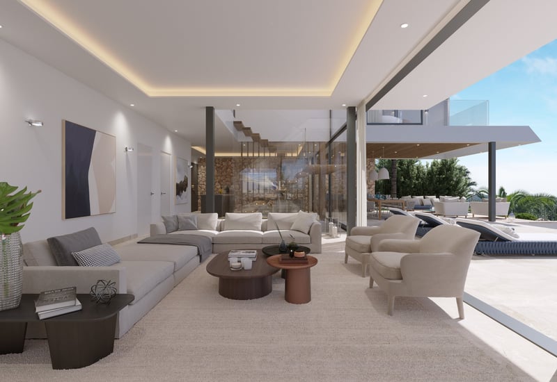 Salon de luxe avec canapés crème et baies vitrées s'ouvrant sur une terrasse ensoleillée et piscine.