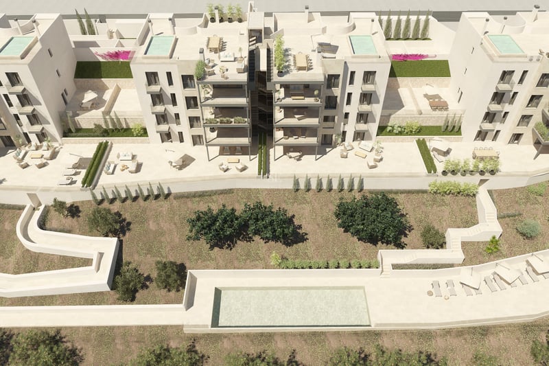 Vue aérienne d'un complexe d'appartements moderne couleur sable avec terrasses privées et piscine commune.