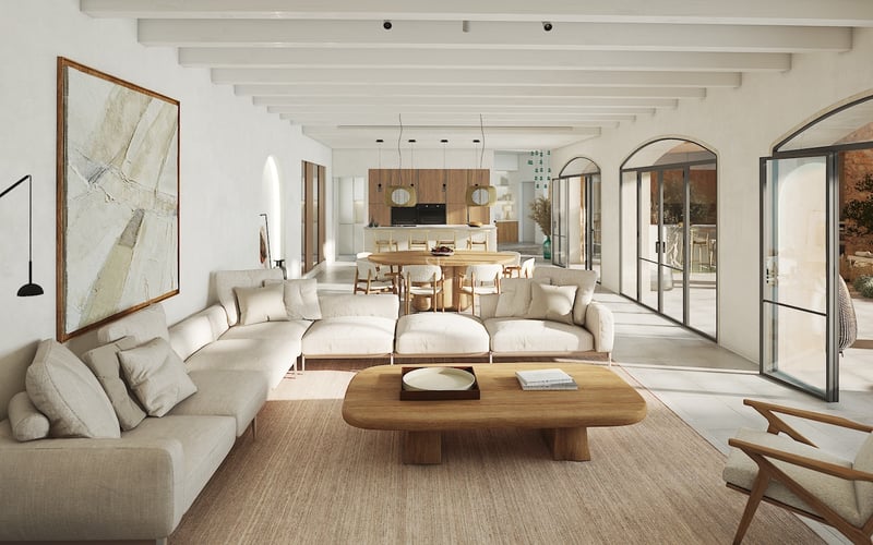 Salón moderno con techos de vigas blancas, grandes puertas arqueadas de cristal y muebles de madera clara.