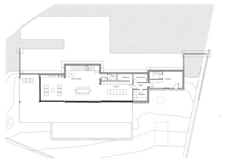 Plan architectural en 2D montrant la disposition du salon, de la cuisine et des zones de service.