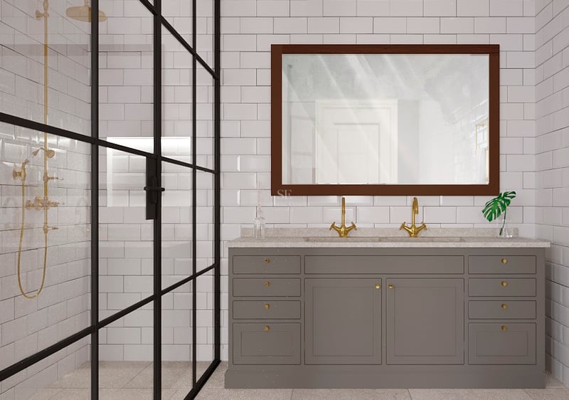 Salle de bain moderne avec double vasque grise, robinets dorés et douche vitrée à cadre noir sur carrelage métro blanc.