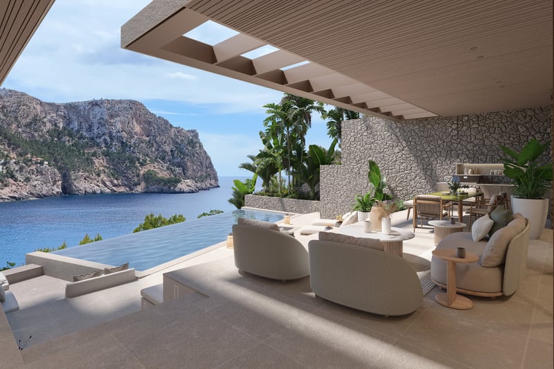 Terrasse couverte avec salon de designer et piscine à débordement offrant une vue sur la mer.